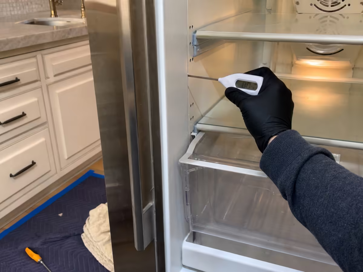Sub-Zero ice maker module and fill tube removed for inspection