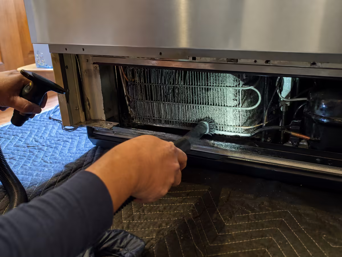 Digital thermometer reading 37 degrees in a Sub-Zero fresh-food compartment after repair